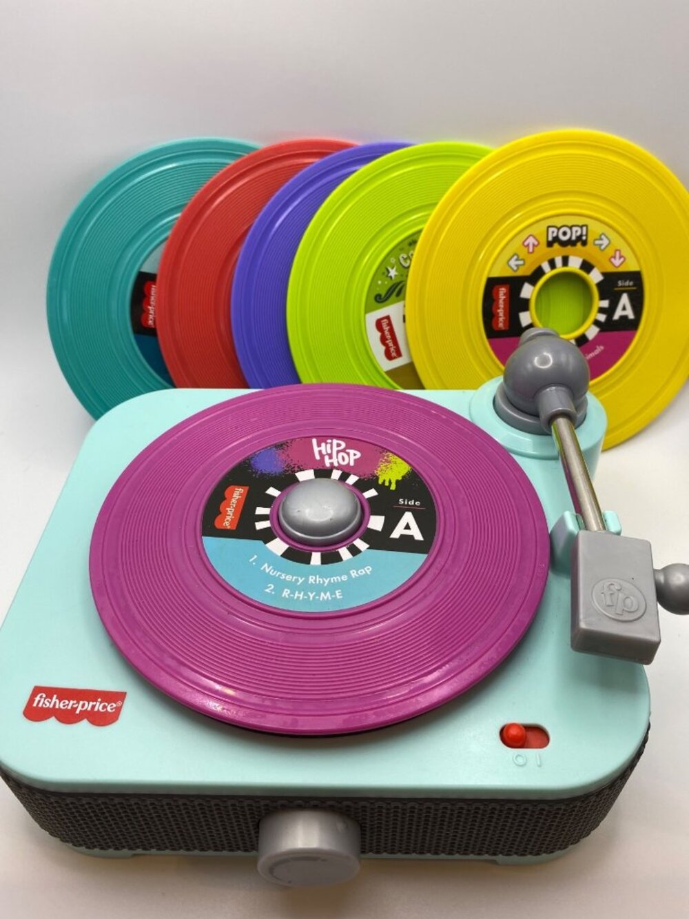Fisher-Price Classic Record Player With 6 Colorful Discs Featuring Kid-Friendly